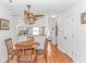 Dining area adjacent to the kitchen with a view into the living area and entry at 914 Hillside Dr. S # O, North Myrtle Beach, SC 29582