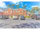 Front exterior with well-maintained brick facade, manicured greenery, and parking at 914 Hillside Dr. S # O, North Myrtle Beach, SC 29582