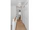 Upstairs hallway with carpet, closet doors, and access to bedrooms at 914 Hillside Dr. S # O, North Myrtle Beach, SC 29582