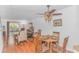 Comfortable living room with dining area, ceiling fan, hardwood floors and natural light at 914 Hillside Dr. S # O, North Myrtle Beach, SC 29582
