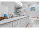 The bathroom has a double vanity, soaking tub and coastal decor at 9430 Pinckney Ln., Murrells Inlet, SC 29576