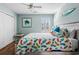 Bedroom decorated with coastal themed bedding and artwork at 9430 Pinckney Ln., Murrells Inlet, SC 29576