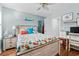 Bedroom view with coastal decor, queen bed, workstation and an attached bathroom at 9430 Pinckney Ln., Murrells Inlet, SC 29576