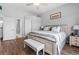 This is a bedroom with a queen bed, coastal decor and an attached bathroom at 9430 Pinckney Ln., Murrells Inlet, SC 29576