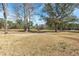 Scenic view of a well-maintained golf course, highlighting the lush landscape and tranquil setting at 9430 Pinckney Ln., Murrells Inlet, SC 29576