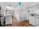 Open kitchen with granite counters and light, coastal decor at 9430 Pinckney Ln., Murrells Inlet, SC 29576