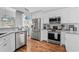 Kitchen boasts stainless steel appliances and updated cabinets at 9430 Pinckney Ln., Murrells Inlet, SC 29576