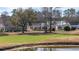 Scenic view of the property's pond and golf course, highlighting a serene and picturesque setting at 9430 Pinckney Ln., Murrells Inlet, SC 29576