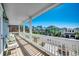 Inviting balcony with white railings, and a view of the neighborhood at 1006 Clubhouse Dr., North Myrtle Beach, SC 29582