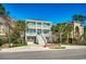 Charming two-story coastal home with dual balconies and ample parking at 1006 Clubhouse Dr., North Myrtle Beach, SC 29582