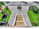 Landscaped front yard featuring a tree in the center and a small set of stairs at 1006 Clubhouse Dr., North Myrtle Beach, SC 29582