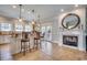 Spacious kitchen with granite countertops, stainless steel appliances, and a view of the fireplace at 1006 Clubhouse Dr., North Myrtle Beach, SC 29582