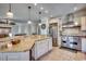 Gourmet kitchen featuring stainless steel appliances, a large island, and granite countertops at 1006 Clubhouse Dr., North Myrtle Beach, SC 29582