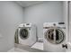 Functional laundry room featuring a modern washer and dryer set at 1006 Clubhouse Dr., North Myrtle Beach, SC 29582