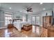 Light-filled main bedroom features hardwood floors and access to the outdoors at 1006 Clubhouse Dr., North Myrtle Beach, SC 29582