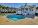 Beautiful pool area with spacious sun deck, perfect for relaxing and entertaining at 1006 Clubhouse Dr., North Myrtle Beach, SC 29582