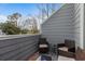 Cozy outdoor balcony with wicker furniture, perfect for enjoying a peaceful view at 1205 Erin Way # 5C, Myrtle Beach, SC 29577