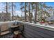 Cozy balcony features outdoor seating, a table, and serene views of the surrounding neighborhood at 1205 Erin Way # 5C, Myrtle Beach, SC 29577