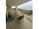 Relax on the balcony with outdoor seating and enjoy the ocean views at 135 S Dunes Dr., Pawleys Island, SC 29585