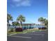 Picturesque lakefront gazebo offers a relaxing retreat with seating and stunning water views at 135 S Dunes Dr., Pawleys Island, SC 29585