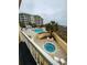 View of the outdoor pool and hot tub at 135 S Dunes Dr., Pawleys Island, SC 29585