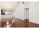 Spacious living area featuring hardwood floors and seamless flow into the kitchen and dining spaces at 1517 Palmina Loop # B, Myrtle Beach, SC 29588