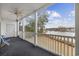 Relaxing covered patio with ceiling fan and beautiful water views at 1537 Lanterns Rest Rd. # 202, Myrtle Beach, SC 29579