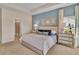 Serene main bedroom featuring a tray ceiling, neutral colors, and a spacious layout at 1609 Seachase Way, North Myrtle Beach, SC 29582