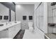 Bathroom with a glass shower, and large vanity with double sinks, and ample storage at 1616 Hawthorn Dr., Pawleys Island, SC 29585