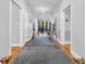 Elegant foyer with hardwood floors, neutral paint, and an open view into the formal living area at 1616 Hawthorn Dr., Pawleys Island, SC 29585