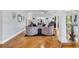 Spacious open concept living room with hardwood floors and stylish furniture at 1616 Hawthorn Dr., Pawleys Island, SC 29585