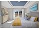 Serene main bedroom with natural light, a view of the golf course, and white window treatments at 1713 Seachase Way, North Myrtle Beach, SC 29582