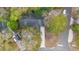 Overhead view of a home situated among mature trees in a residential area at 177 Reef Run Rd., Pawleys Island, SC 29585