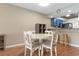 This dining room features a table and chairs with space for four at 1851 Fairway Ridge # 7C, Surfside Beach, SC 29575