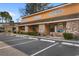 Inviting townhome exterior featuring a brick facade and covered entryways at 1851 Fairway Ridge # 7C, Surfside Beach, SC 29575