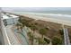 Breathtaking aerial view featuring a lazy river and boardwalk access to the beach at 1903 S Ocean Blvd. # 606, North Myrtle Beach, SC 29582