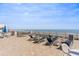 Oceanfront sundeck with lounge chairs and tables, perfect for relaxation with beautiful ocean views at 1903 S Ocean Blvd. # 606, North Myrtle Beach, SC 29582