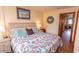 Bedroom with large bed and nautical decor at 2001 S Ocean Blvd. # 418, Myrtle Beach, SC 29577