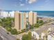 Elevated aerial view of the high-rise condo buildings and the ocean beyond at 201 75Th Ave N # 4094, Myrtle Beach, SC 29572