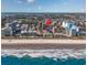 Aerial view showcases the beach with building tops; an arrow points to the condo location at 201 75Th Ave N # 4094, Myrtle Beach, SC 29572