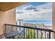 Balcony featuring metal table set offering panoramic ocean views and surrounding building tops at 201 75Th Ave N # 4094, Myrtle Beach, SC 29572