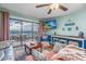 Comfortable living room featuring a large balcony with ocean views at 201 75Th Ave N # 4094, Myrtle Beach, SC 29572