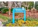 Sign for Ocean Dunes Resort and Villas - Tower I amidst lush landscaping and colorful flowers at 201 75Th Ave N # 4094, Myrtle Beach, SC 29572