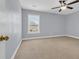 Bedroom with a ceiling fan and a window providing ample natural light at 228 Gresham Ln., Myrtle Beach, SC 29588