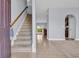 Bright foyer with tiled floors and staircase leading to the second floor at 228 Gresham Ln., Myrtle Beach, SC 29588