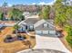 Aerial view of a single-Gathering home with a three-car garage and well-maintained landscaping at 229 Duchess Ct., Myrtle Beach, SC 29588