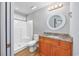 Functional bathroom featuring a shower, toilet, vanity, and wood-look flooring at 229 Duchess Ct., Myrtle Beach, SC 29588