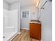 Functional bathroom with a shower stall, single vanity, and wood-look flooring at 229 Duchess Ct., Myrtle Beach, SC 29588