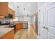 Stylish kitchen with stainless steel appliances, granite counters, and wood-look flooring at 229 Duchess Ct., Myrtle Beach, SC 29588