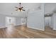 Open-concept living room with wood floors, neutral walls, and high ceilings at 229 Duchess Ct., Myrtle Beach, SC 29588